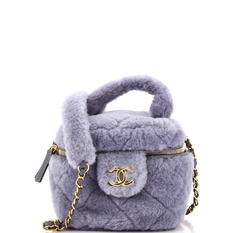 Ladies Prada Re - Edizione 2005 bags with a star - shaped charm for a playful touchCoconing Top Handle Vanity Case with Chain Quilted Shearling Small