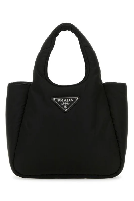 Prada Cleo bags with a contrast - colored interior for visual interestPrada Woman Black Nylon Handbag