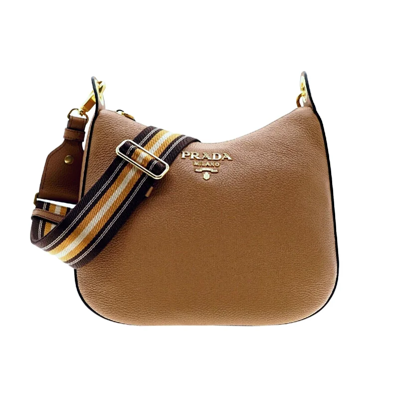 Prada Cahier bags featuring the signature triangular logo plaquePrada Vitello Phenix Caramel Brown Leather Web Stripe Crossbody Bag