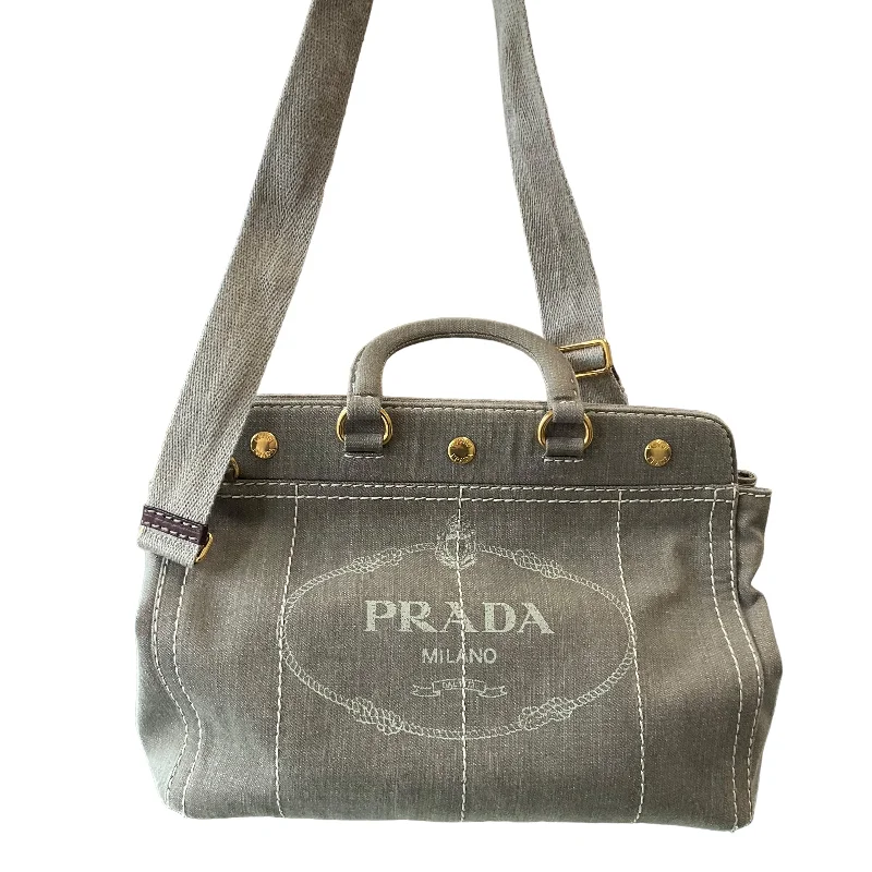 Prada Cleo bags with a detachable coin purse for added functionalityPrada Canapa Two-Way Snap Tote