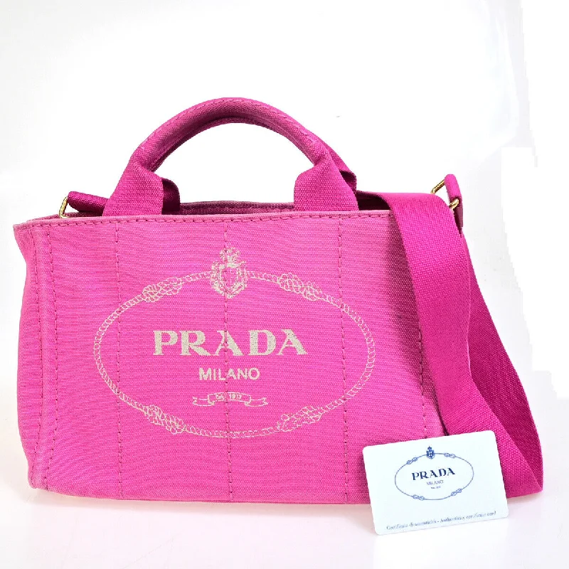 Prada bags with a front - zip pocket for small items like cards and keysPRADA Canapa Handbag