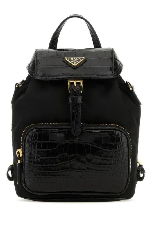 Ladies Prada handbags with a detachable wallet inside for added conveniencePrada Woman Black Re-Nylon And Leather Backpack