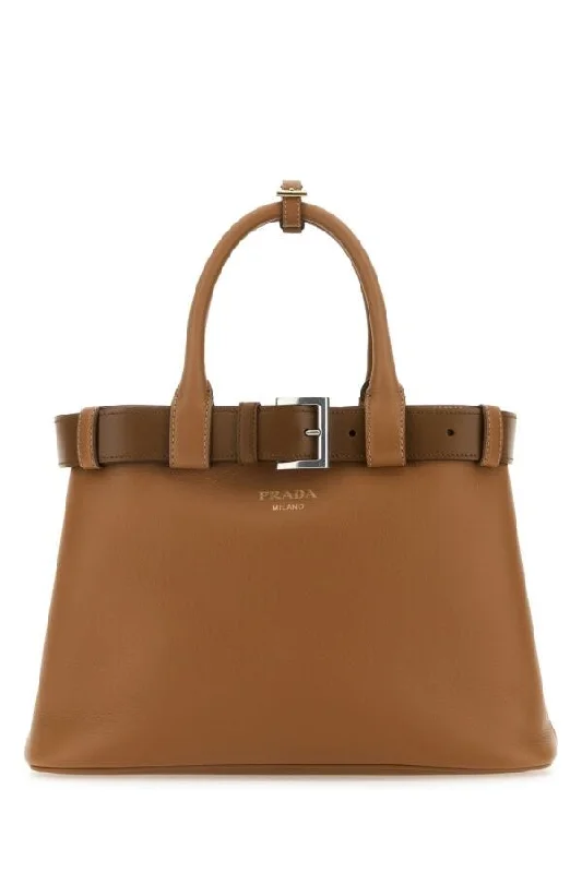 Prada nylon backpacks with a hidden back pocket for securityPrada Woman Caramel Leather Prada Buckle Medium Handbag