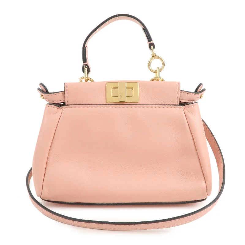 Ladies Fendi Sunshine Shopper bags in a pastel shade like mint for a soft and delicate appearanceFENDI Micro Peekaboo Leather 2Way Bag Hand Bag Pink 8M0355