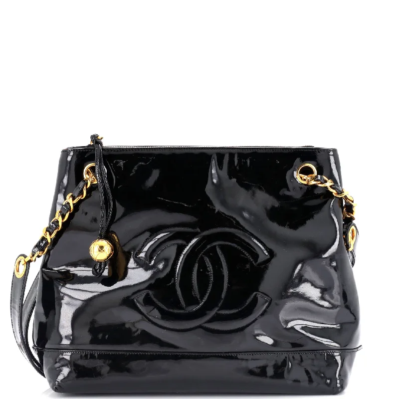 Prada Cleo bags with a contrast - colored interior for visual interestVintage Timeless Chain Shoulder Bag Patent Medium