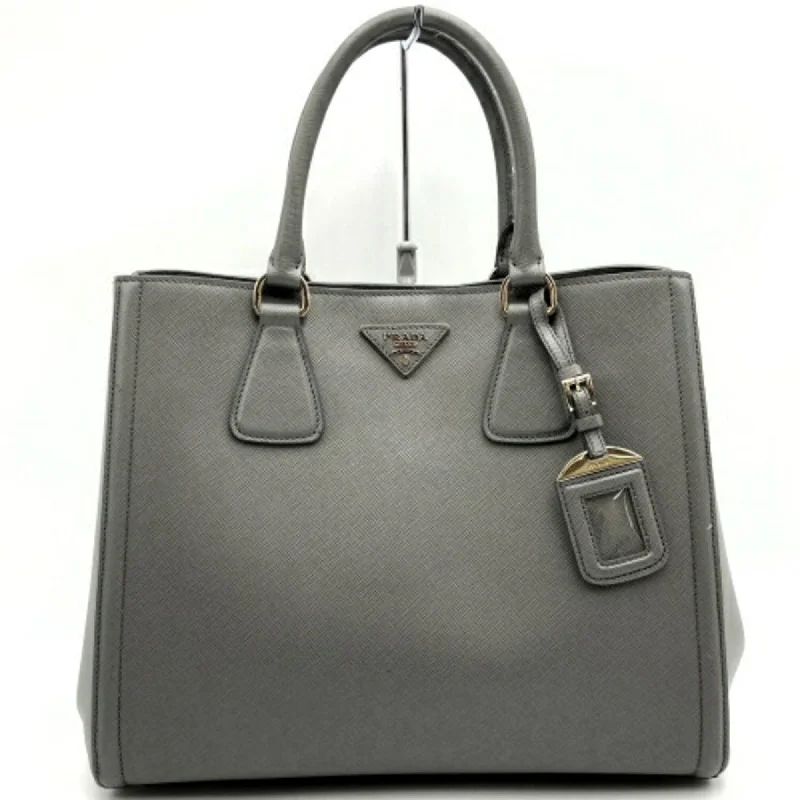 Ladies Prada handbags with a detachable wallet inside for added conveniencePRADA Saffiano Handbag