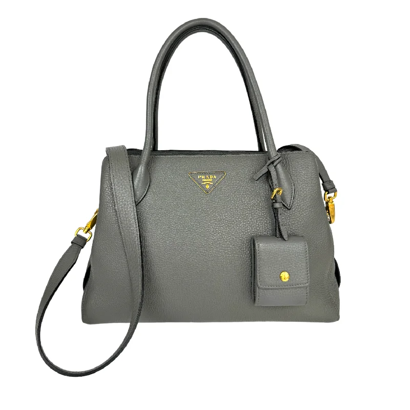 Prada tote bags with a printed Prada logo on the front for brand visibilityPrada Handbag Grey Vitello Daino