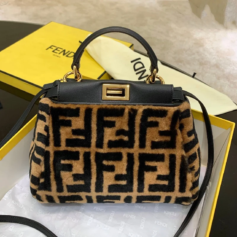 Fendi crossbody bags with a printed floral pattern for a feminine and romantic touchFendi Handle Bag 27cm Brown