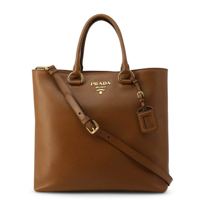 Prada Cleo bags with a contrast - colored interior for visual interestPrada Vitello Phenix Cognac Brown Shopping Tote Bag