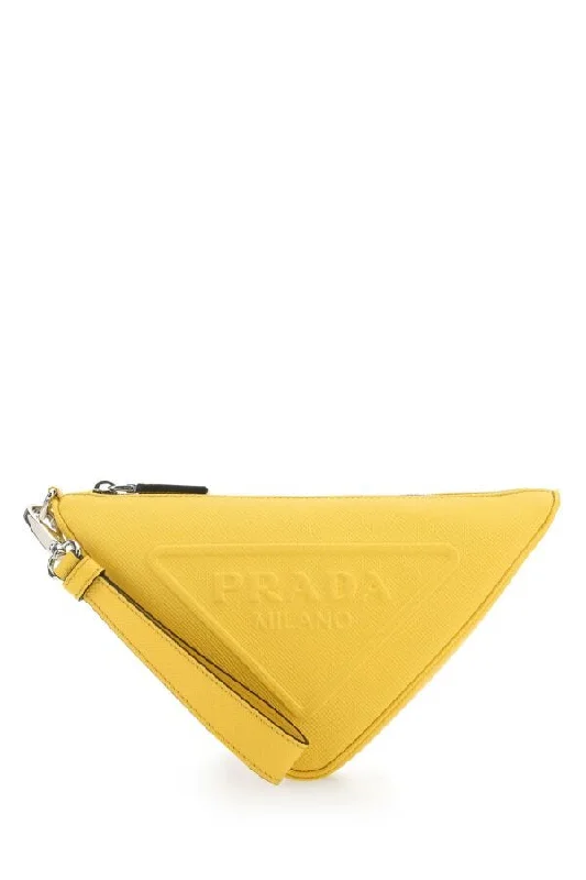 Prada handbags with a perforated leather detail for a unique and breathable designPrada Man Yellow Leather Triangle Clutch