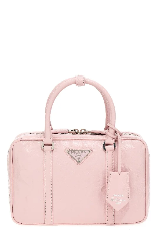 Prada Cahier bags with a monogram - embossed leather surfacePrada Women 'Nappa Antique' Midi Top Handbag