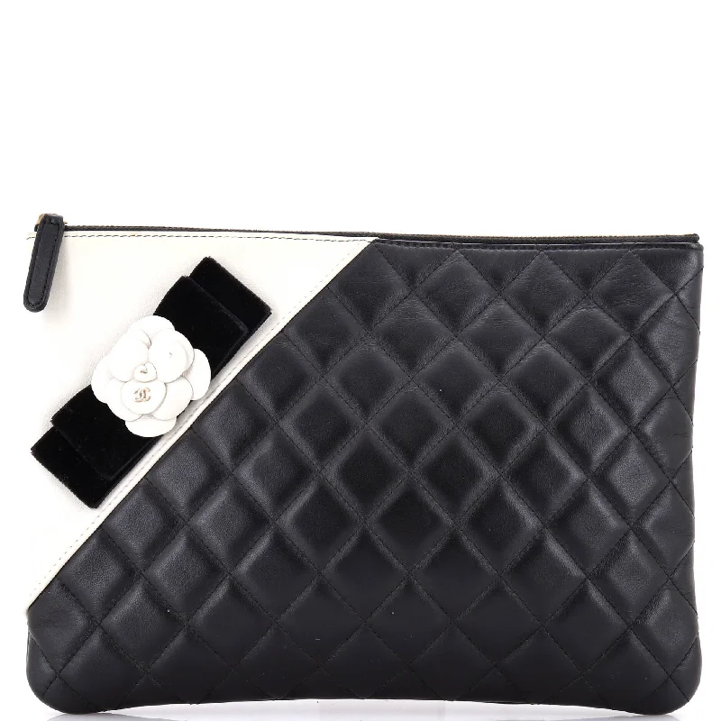 Prada Cleo bags with a contrast - colored interior for visual interestCamellia O Case Clutch Quilted Lambskin Medium