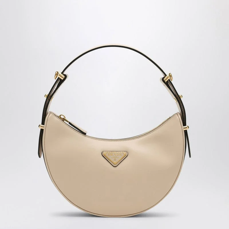 Prada bags with a front - flap pocket for quick access to essentialsPrada Beige Leather Prada Arqué Bag Women