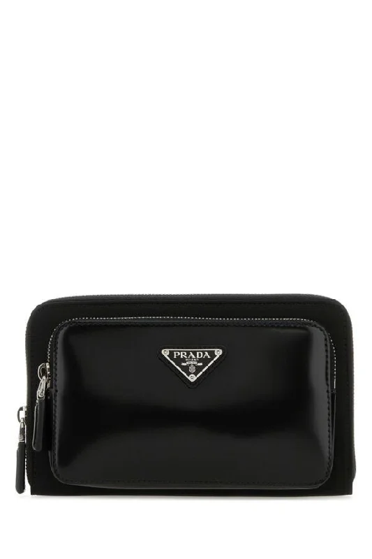 Ladies Prada Re - Edizione 2005 bags with a star - shaped charm for a playful touchPrada Man Black Leather And Re-Nylon Belt Bag