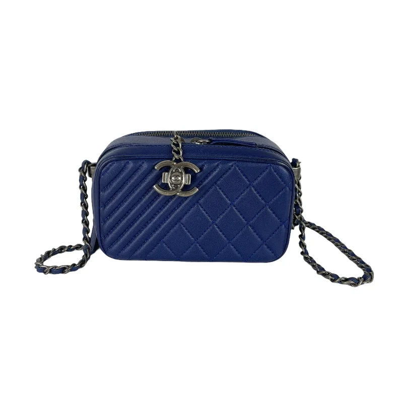 Chanel bags with exclusive seasonal designs and materialsMini Coco Boy Camera Case Blue RHW