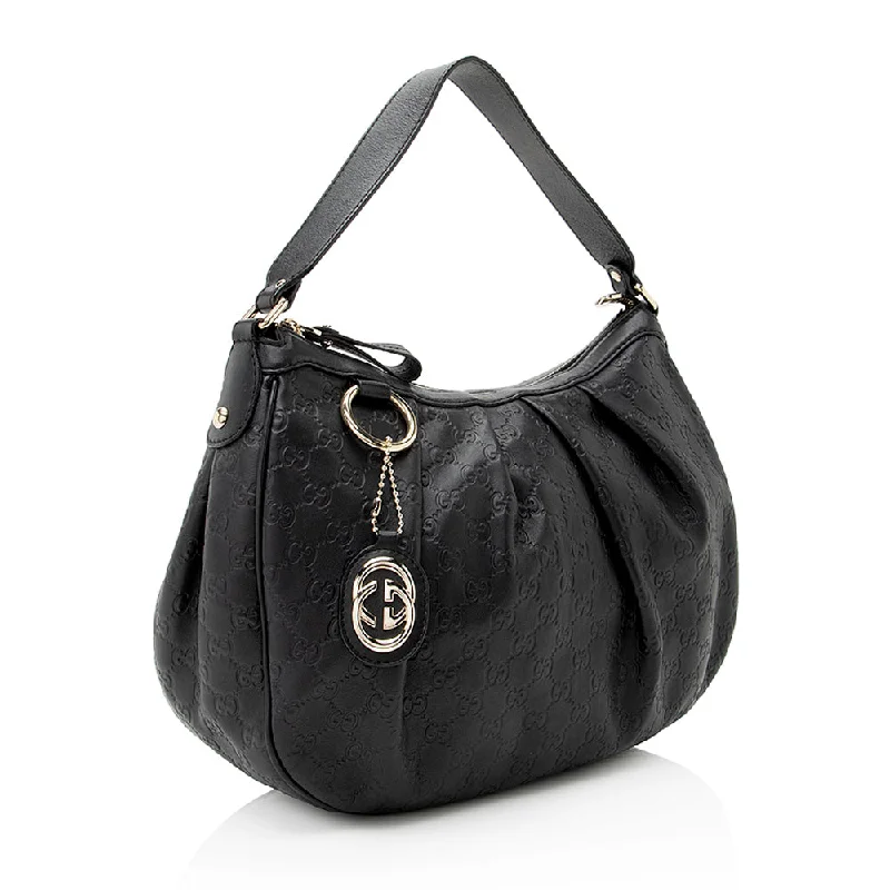 Women Gucci bags with a snap - button closure and a decorative charmGucci Guccissima Leather Sukey Hobo (21862)