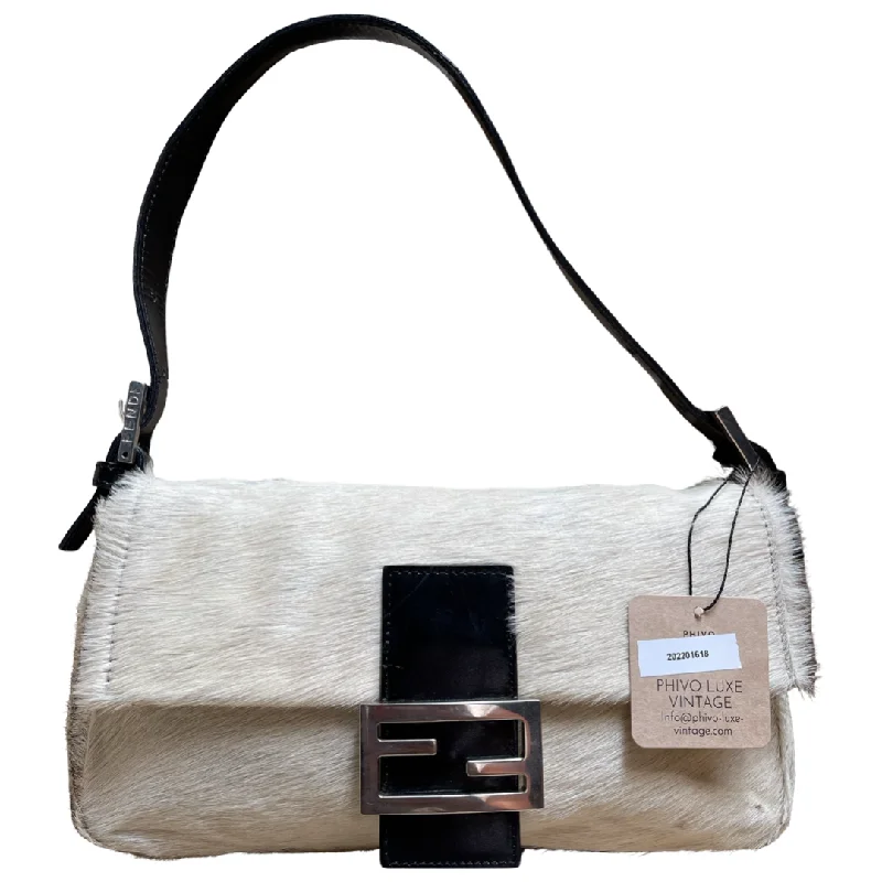 Fendi By The Way bags with a detachable pouch for separating small itemsFENDI baguette pony hair shoulder bag